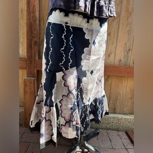 Floral and geometric print skirt with flared hem. Size 8.